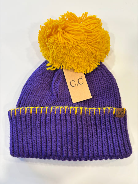 C. C. Pom beanie ￼